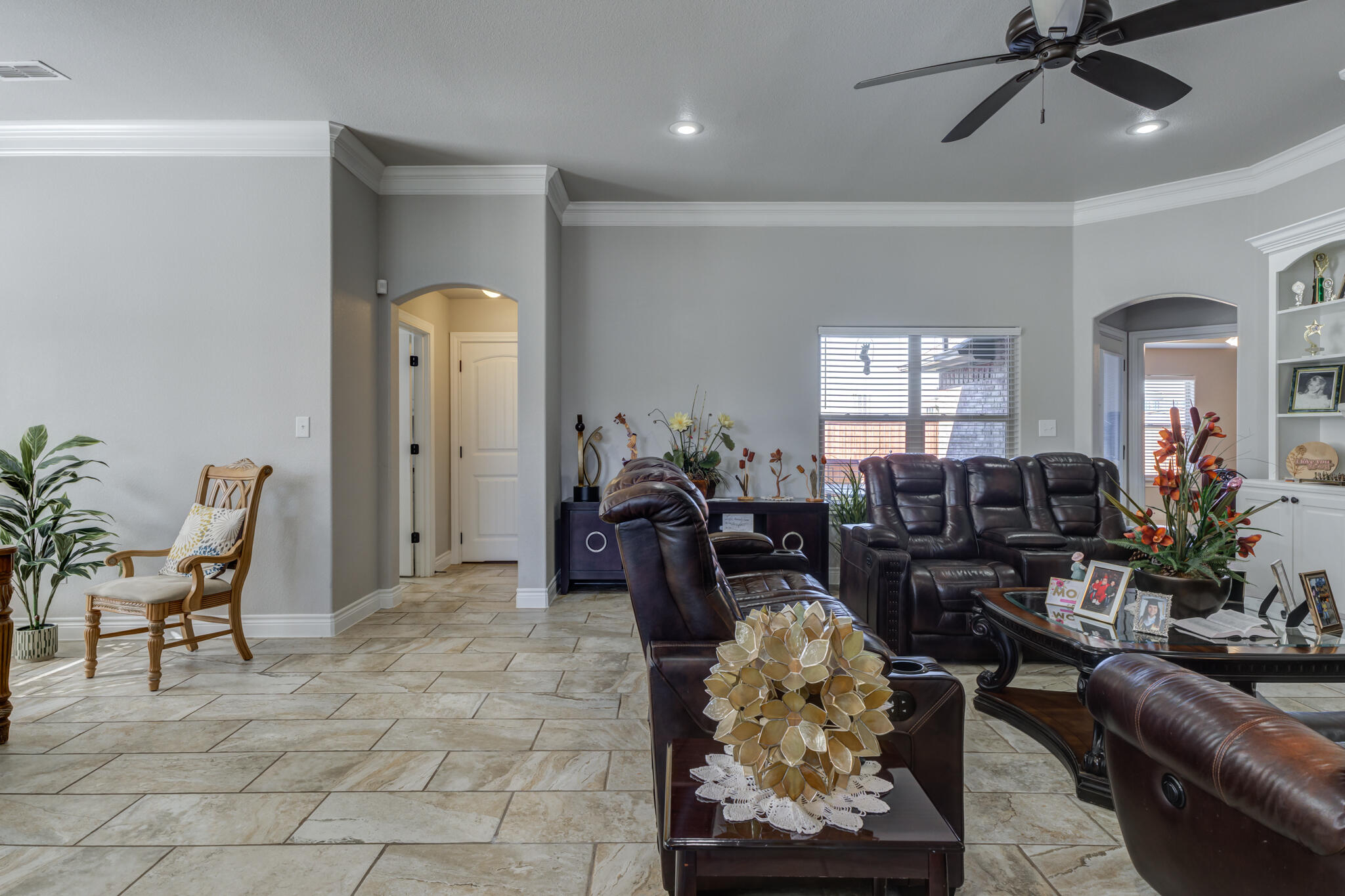 6306 87th Street Lubbock, TX 79424 - Photo 6 of 47 a living room with furniture and wooden floor