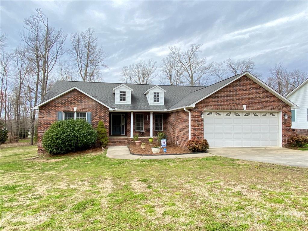 1168 Balfour Quarry Road Salisbury, NC 28146 - Photo 1 of 47 a front view of a house with garden