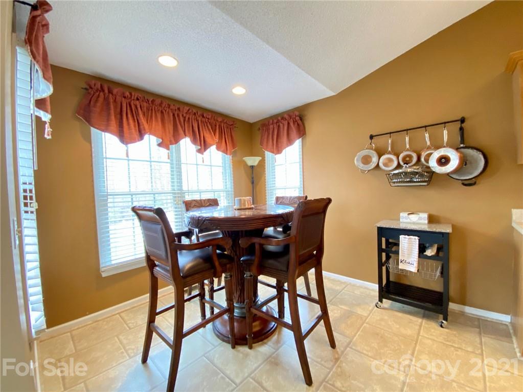 1168 Balfour Quarry Road Salisbury, NC 28146 - Photo 14 of 47 a view of a dining room with furniture and window