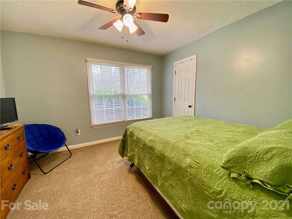 1168 Balfour Quarry Road Salisbury, NC 28146 - Photo 19 of 47 a spacious bedroom with a bed and a window