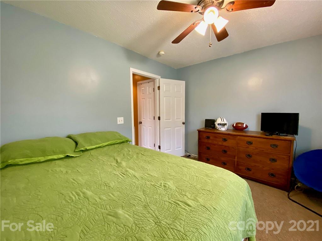 1168 Balfour Quarry Road Salisbury, NC 28146 - Photo 20 of 47 a bed room with a bed and a television