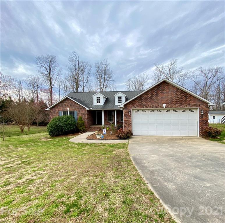 1168 Balfour Quarry Road Salisbury, NC 28146 - Photo 3 of 47 a view of a house with a yard and garage