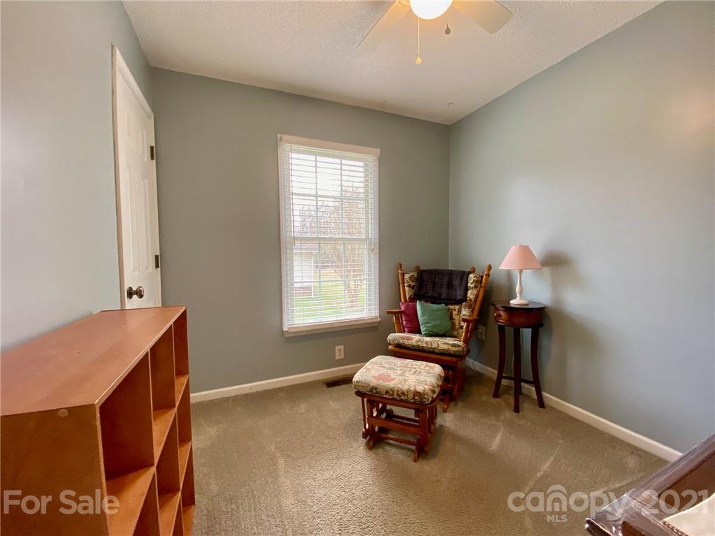 1168 Balfour Quarry Road Salisbury, NC 28146 - Photo 22 of 47 a living room with furniture and a window