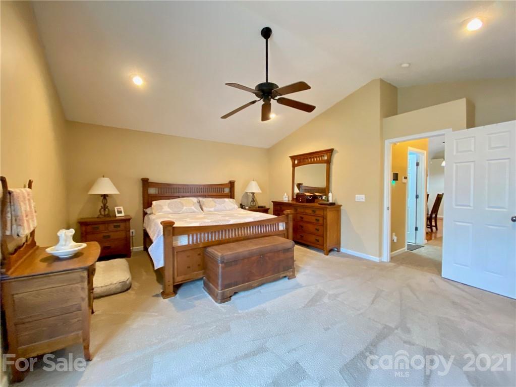 1168 Balfour Quarry Road Salisbury, NC 28146 - Photo 33 of 47 a spacious bedroom with a bed and ceiling fan
