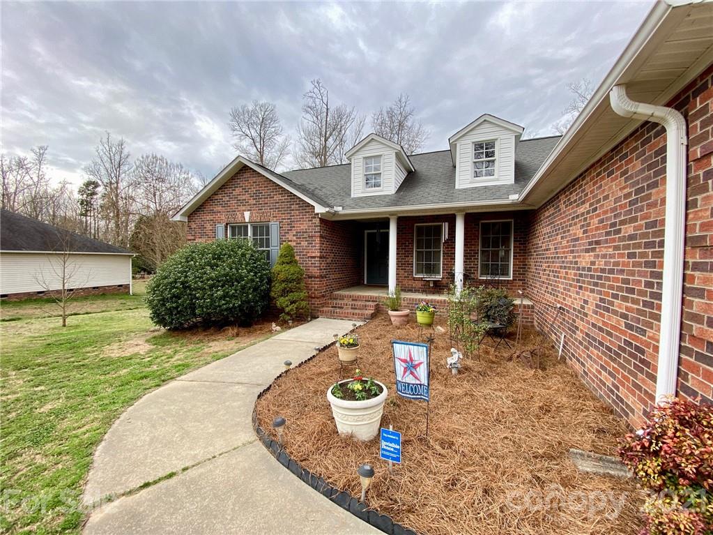 1168 Balfour Quarry Road Salisbury, NC 28146 - Photo 6 of 47 a front view of a house with yard