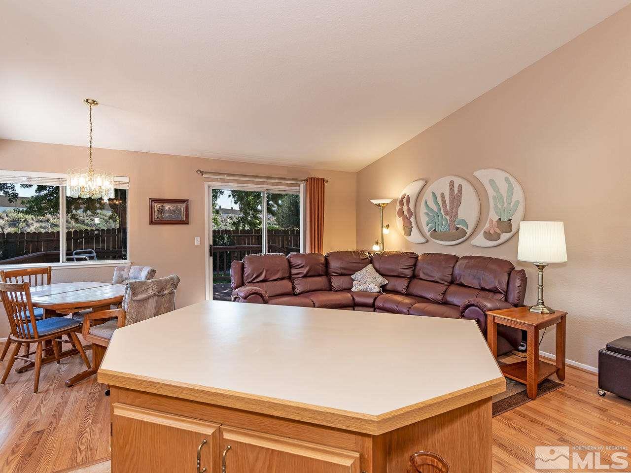 7710 Pickering Circle Reno, NV 89511 - Photo 4 of 16 a view of a dining room with furniture window and outside view