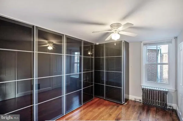 a kitchen with stainless steel appliances granite countertop a refrigerator sink and stove