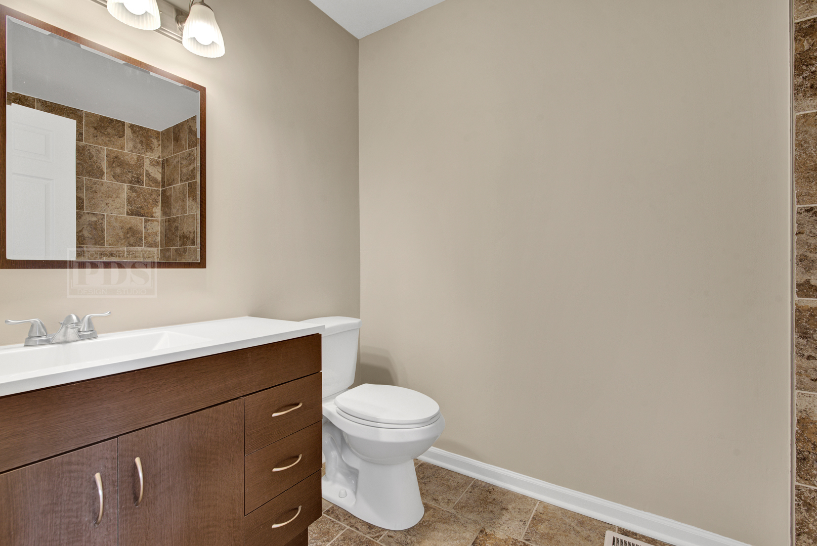 5762 Timberlane Road Matteson, IL 60443 - Photo 14 of 23 a bathroom with a sink a toilet and a window