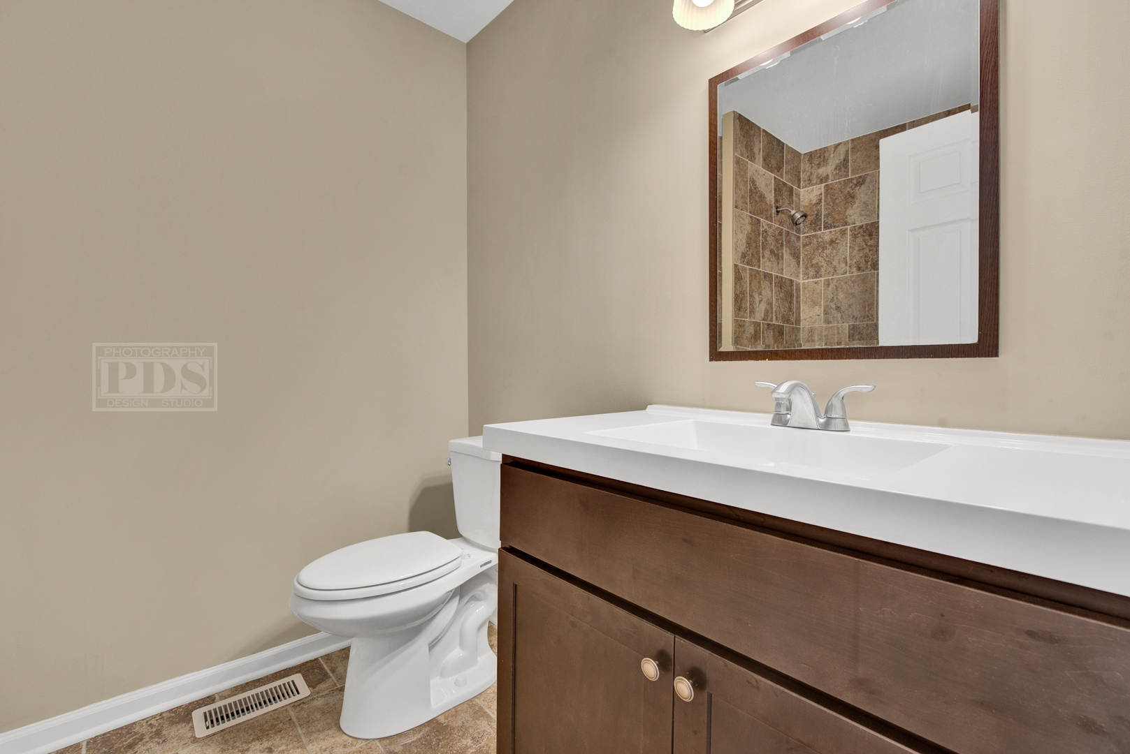 5762 Timberlane Road Matteson, IL 60443 - Photo 20 of 23 a bathroom with a granite countertop sink mirror vanity and toilet