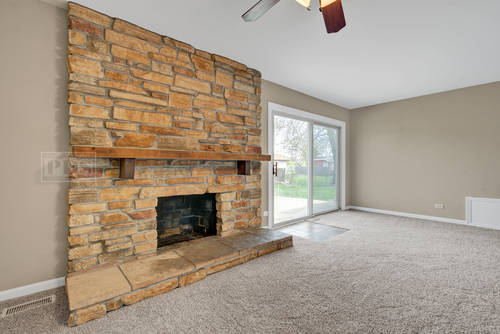 5762 Timberlane Road Matteson, IL 60443 - Photo 10 of 23 a living room with furniture and a fireplace