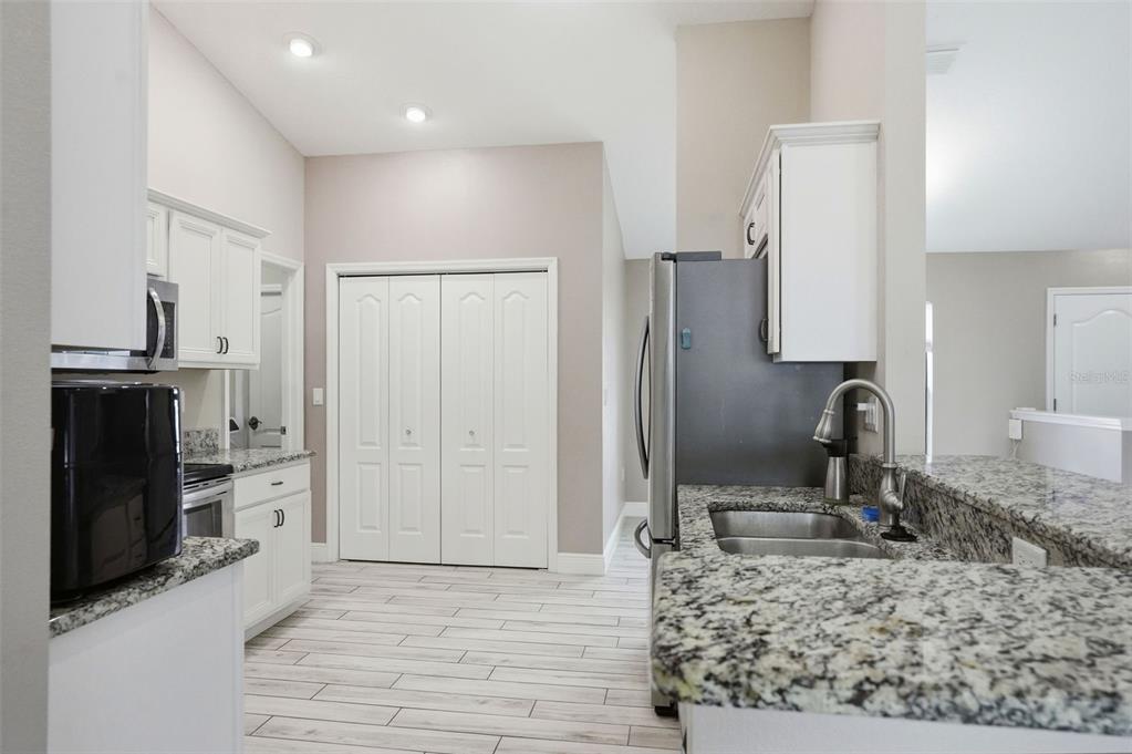 4128 Everett Avenue Spring Hill, FL 34609 - Photo 12 of 57 a view of a kitchen counter space and a sink