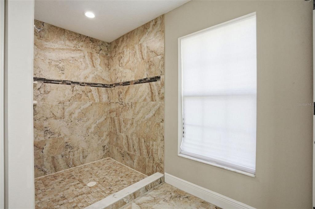 4128 Everett Avenue Spring Hill, FL 34609 - Photo 34 of 57 a bathroom with a shower