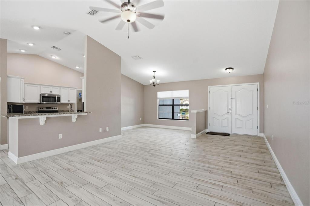 4128 Everett Avenue Spring Hill, FL 34609 - Photo 5 of 57 a view of kitchen with sink and refrigerator