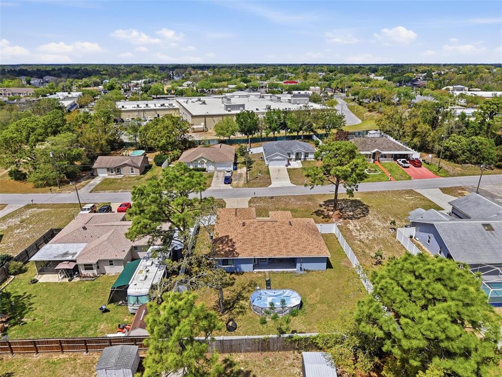 4128 Everett Avenue Spring Hill, FL 34609 - Photo 51 of 57 an aerial view of residential houses with outdoor space