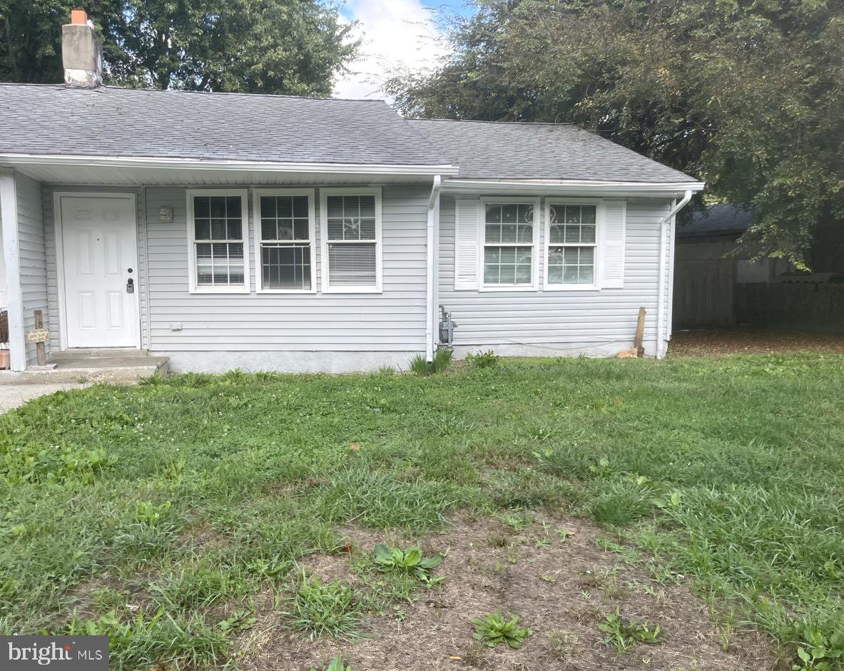 216 Kinsley Road Pemberton, NJ 08068 - Photo 1 of 19 a front view of a house with a yard
