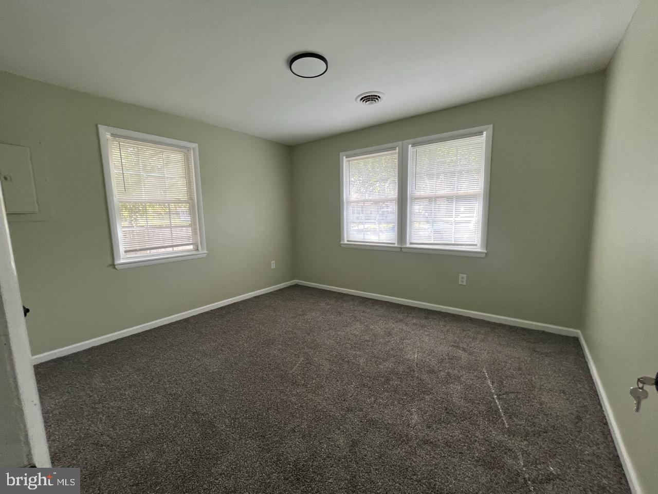 216 Kinsley Road Pemberton, NJ 08068 - Photo 16 of 19 an empty room with a window
