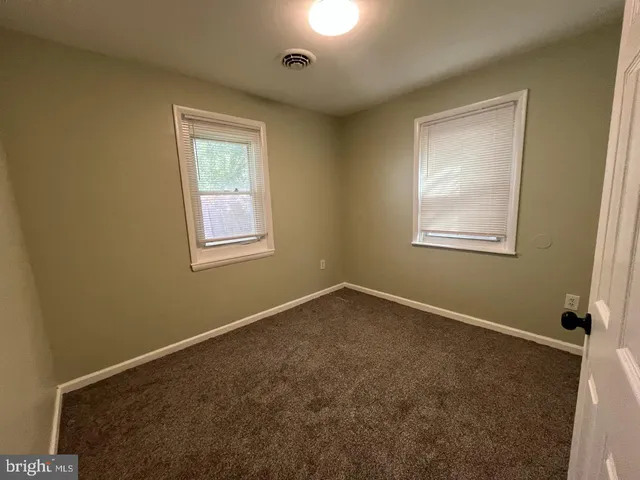 an empty room with an entryway