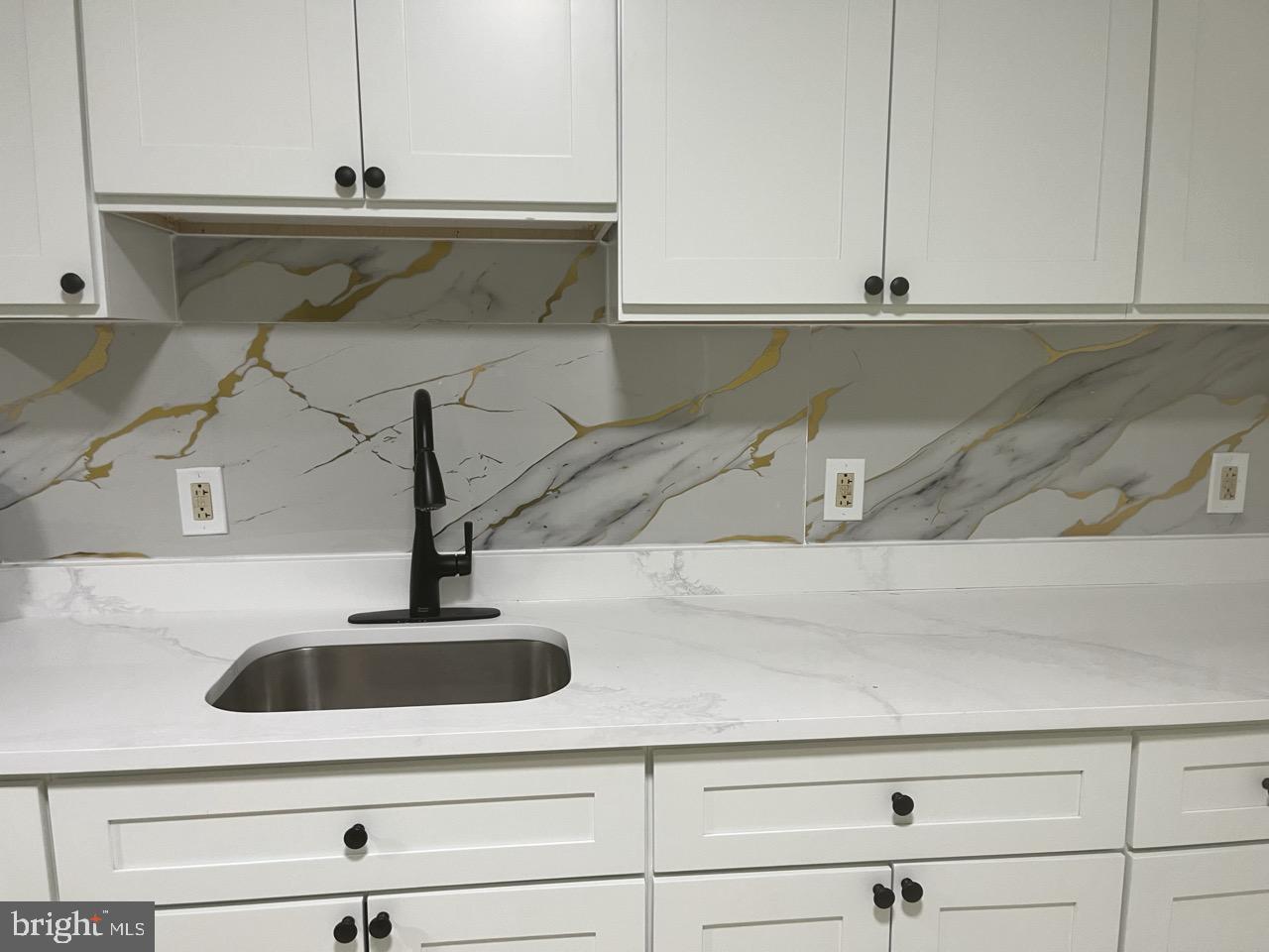 216 Kinsley Road Pemberton, NJ 08068 - Photo 3 of 19 a close view of sink and tap