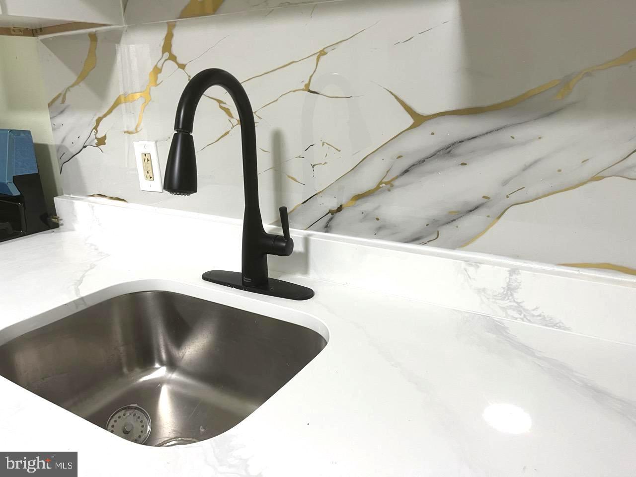 216 Kinsley Road Pemberton, NJ 08068 - Photo 4 of 19 a kitchen with a sink and a stove