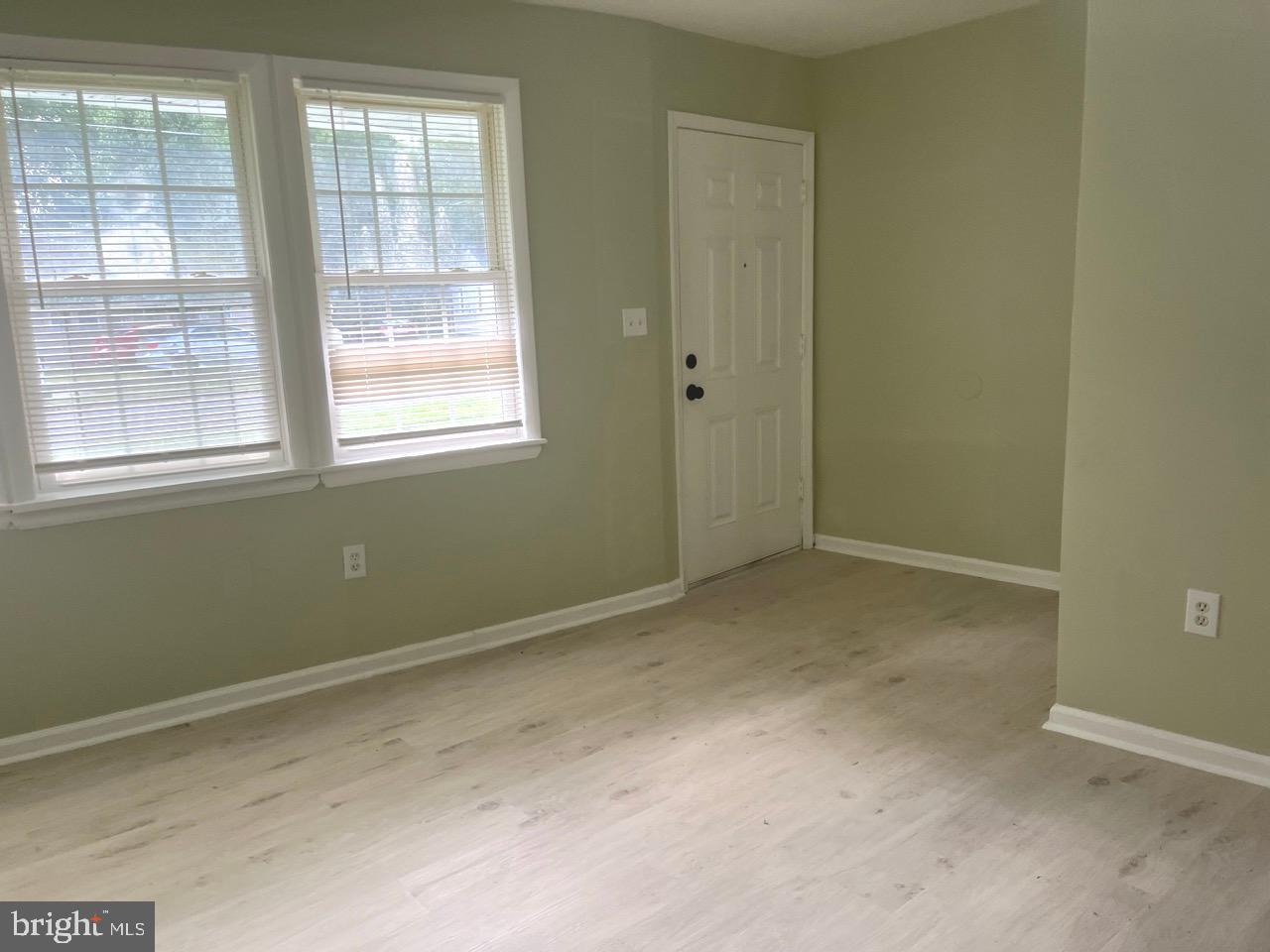 216 Kinsley Road Pemberton, NJ 08068 - Photo 8 of 19 an empty room with windows