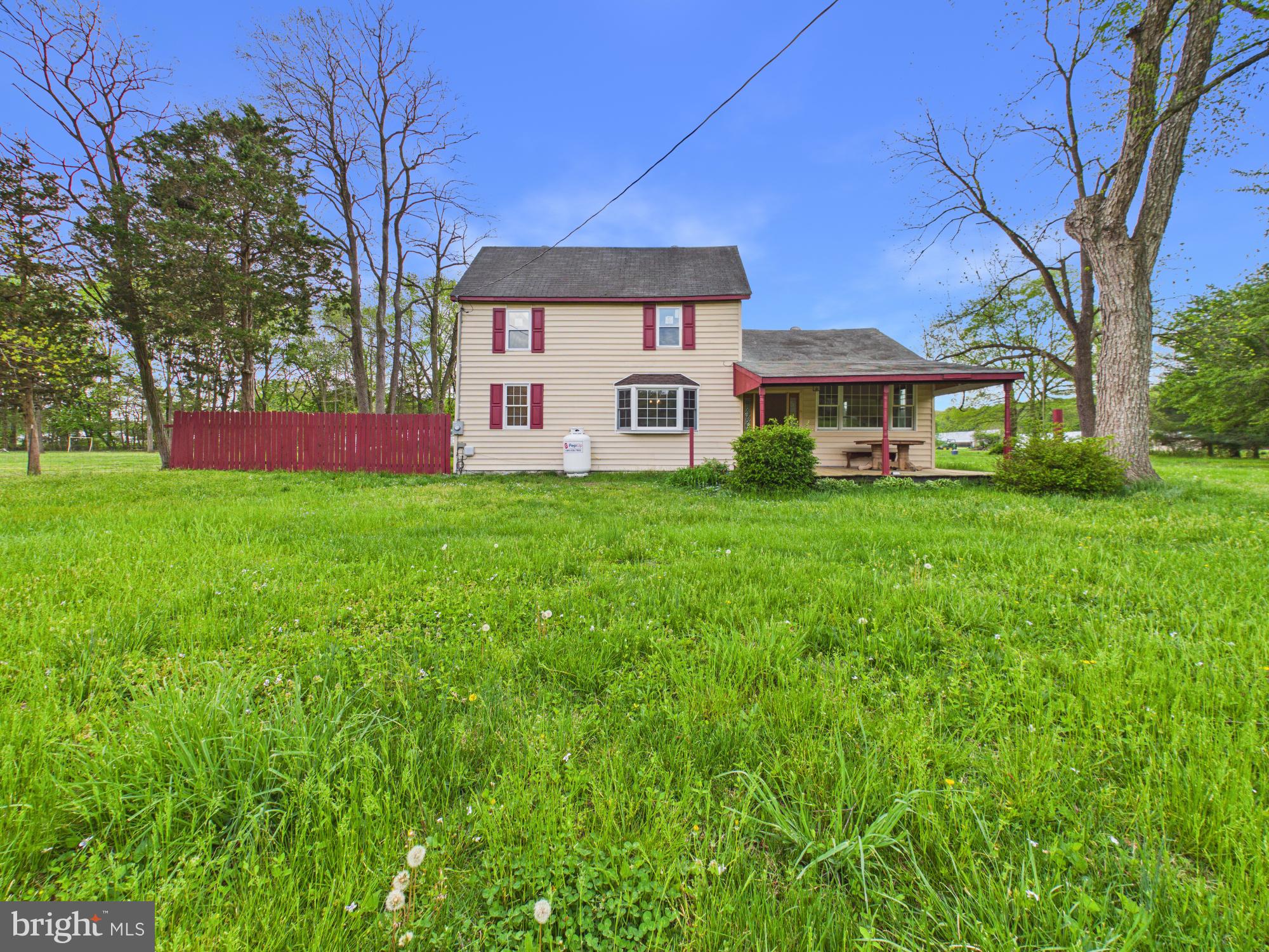 324 Jebb Road Camden Wyoming, DE 19934 - Photo 1 of 49 a front view of a house with a yard