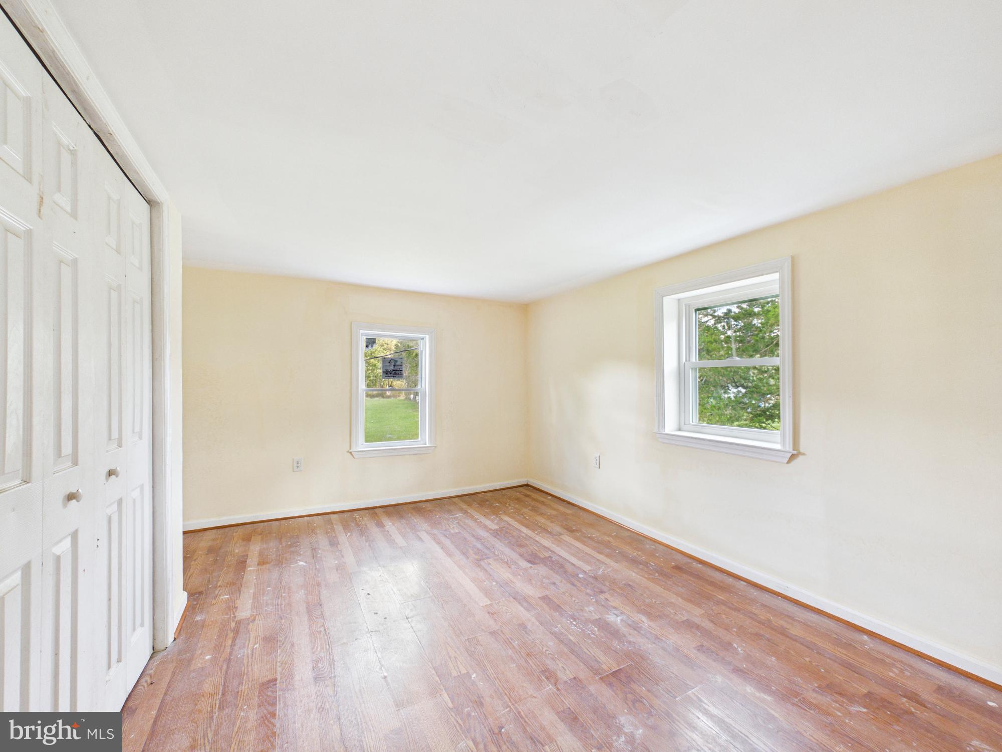 324 Jebb Road Camden Wyoming, DE 19934 - Photo 20 of 49 an empty room with wooden floor and windows