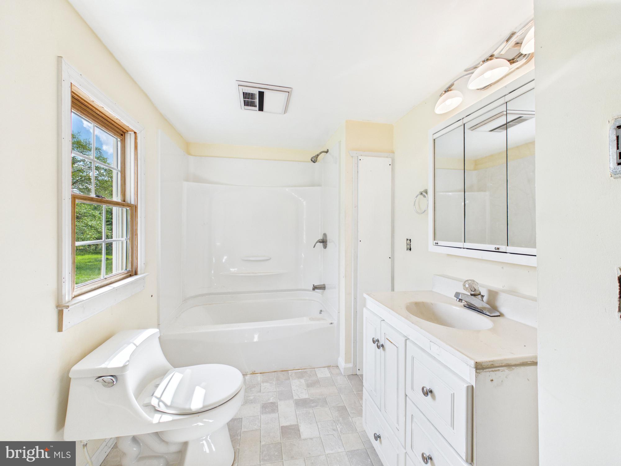 324 Jebb Road Camden Wyoming, DE 19934 - Photo 23 of 49 a bathroom with a granite countertop sink toilet and shower