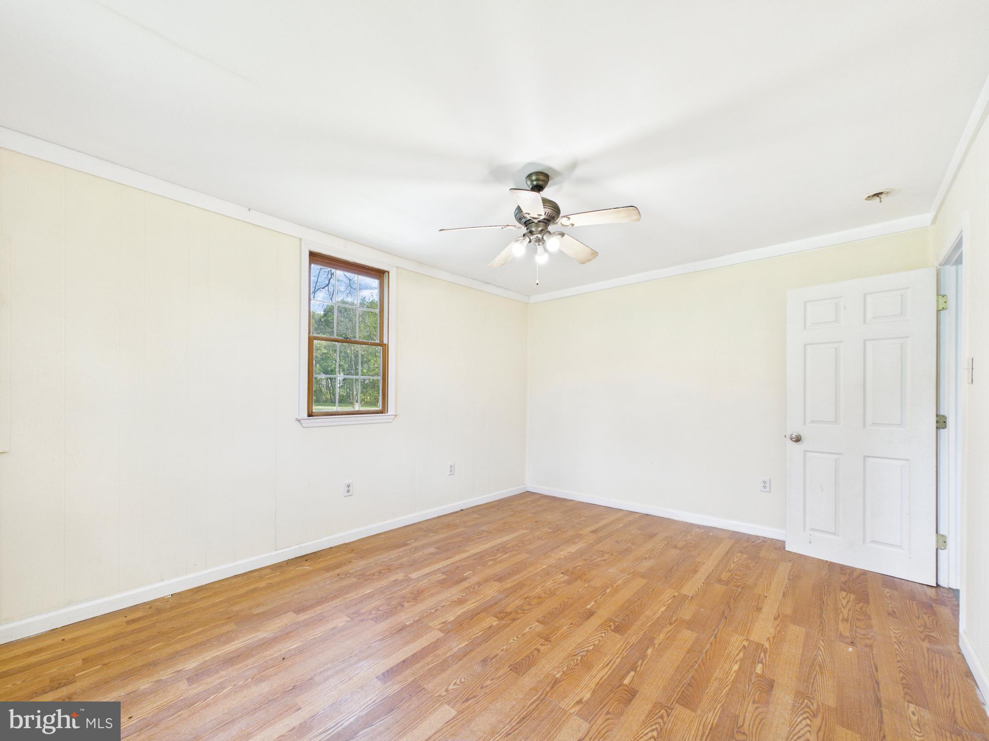 324 Jebb Road Camden Wyoming, DE 19934 - Photo 10 of 49 a view of empty room with wooden floor