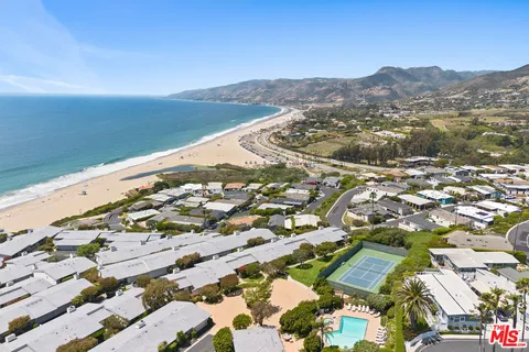 an aerial view of a residential apartment building with entryway