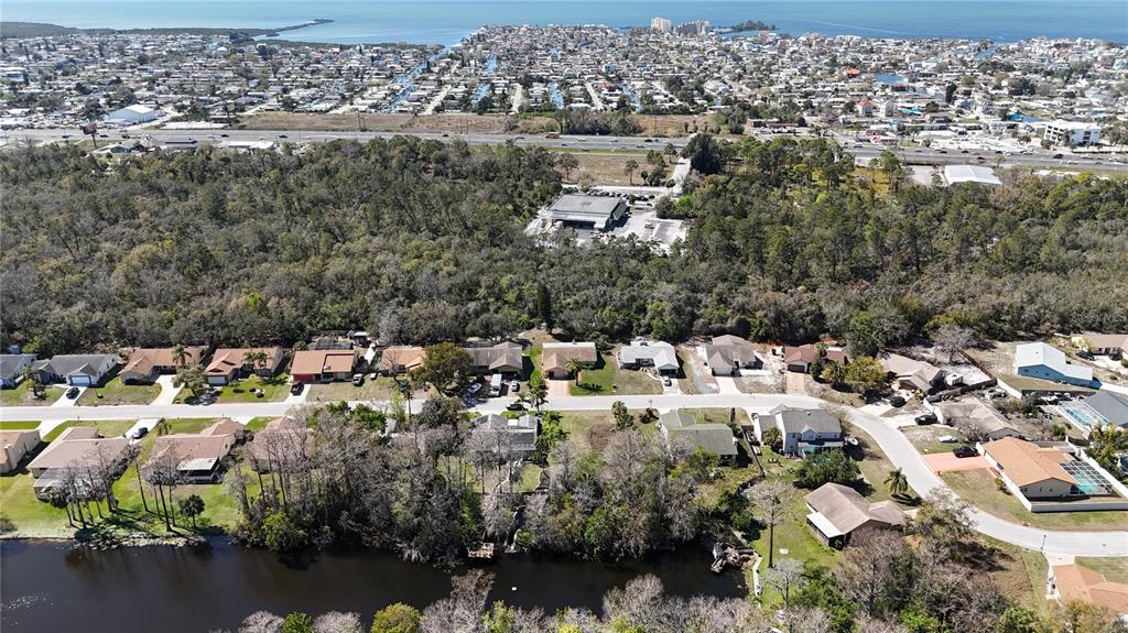 Whitby Road Hudson, FL 34667 - Photo 11 of 28 an aerial view of a city with lots of residential buildings
