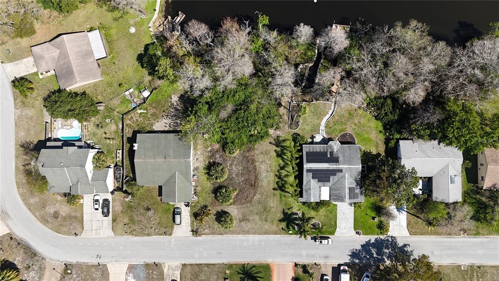 Whitby Road Hudson, FL 34667 - Photo 16 of 28 an aerial view of a residential houses with yard
