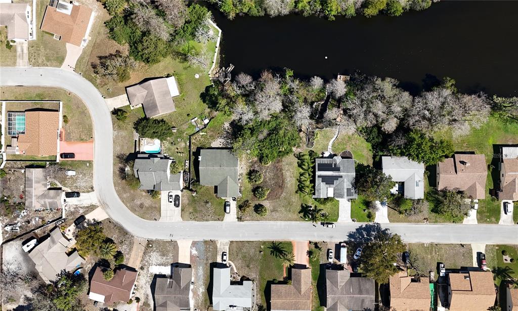 Whitby Road Hudson, FL 34667 - Photo 18 of 28 an aerial view of multiple houses with outdoor space