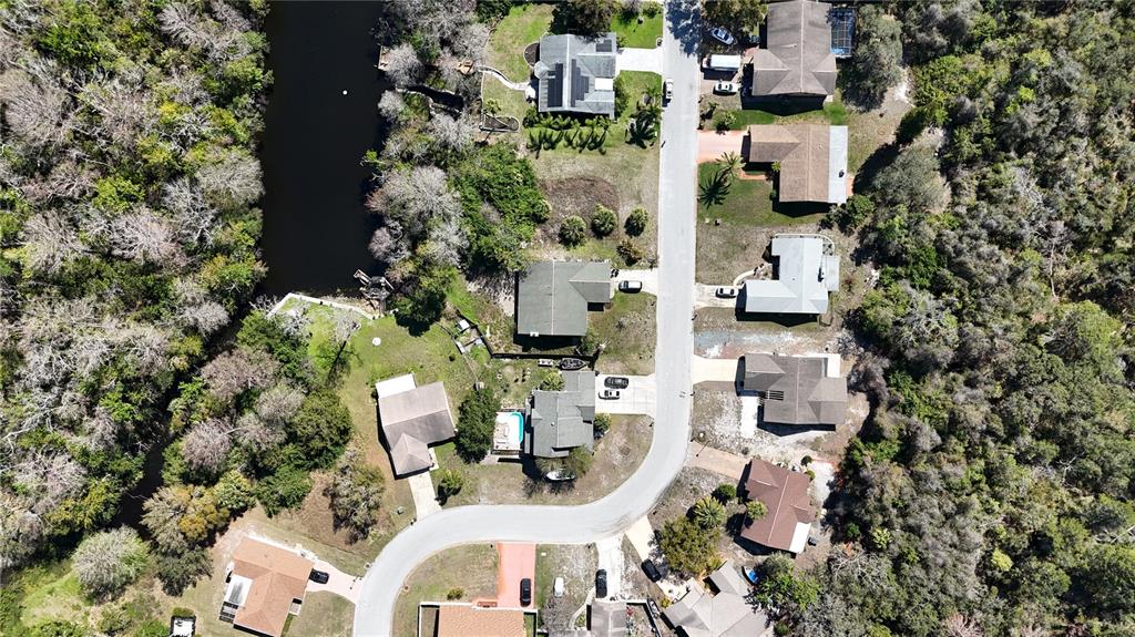 Whitby Road Hudson, FL 34667 - Photo 23 of 28 an aerial view of multiple house with yard