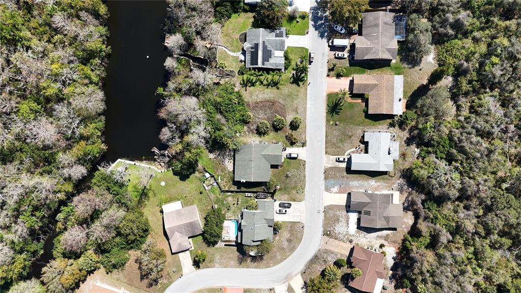 Whitby Road Hudson, FL 34667 - Photo 24 of 28 aerial view of multiple houses with outdoor space