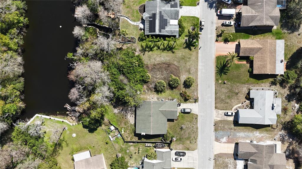 Whitby Road Hudson, FL 34667 - Photo 26 of 28 an aerial view of multiple houses with yard