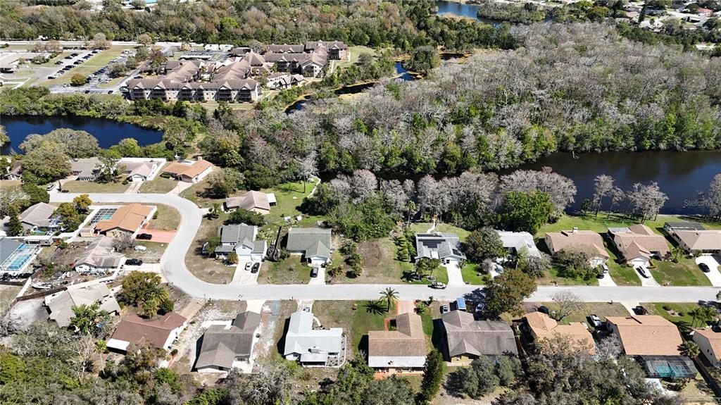 Whitby Road Hudson, FL 34667 - Photo 4 of 28 an aerial view of residential houses with outdoor space