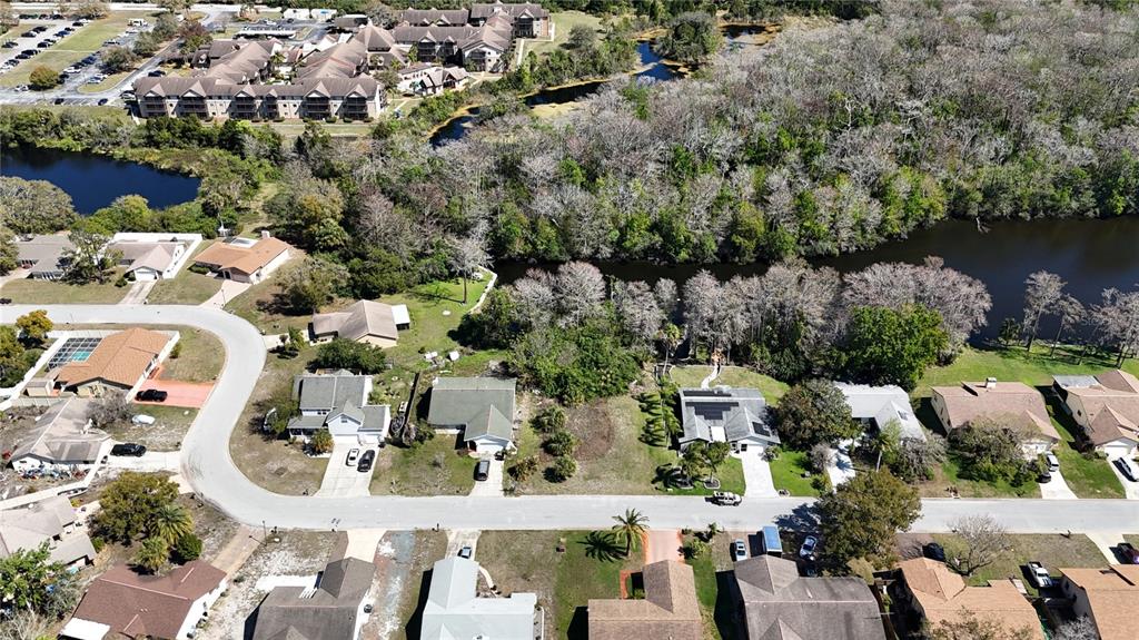 Whitby Road Hudson, FL 34667 - Photo 5 of 28 an aerial view of multiple houses with yard