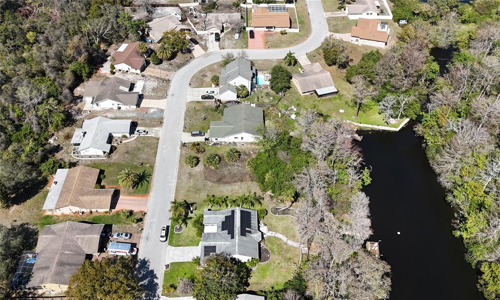 Whitby Road Hudson, FL 34667 - Photo 6 of 28 an aerial view of residential houses with outdoor space