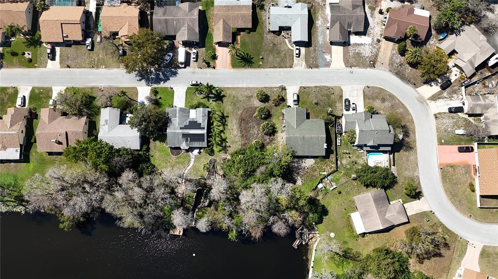 Whitby Road Hudson, FL 34667 - Photo 9 of 28 an aerial view of multiple houses with yard