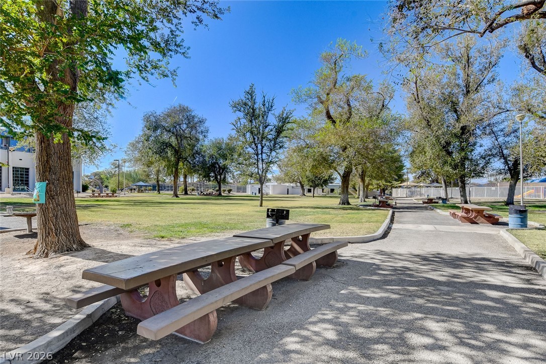 4840 Summerhill Road Las Vegas, NV 89121 - Photo 56 of 56 Green spaces and pathways provide a perfect setting for outdoor enjoyment with picnic tables and shade trees.