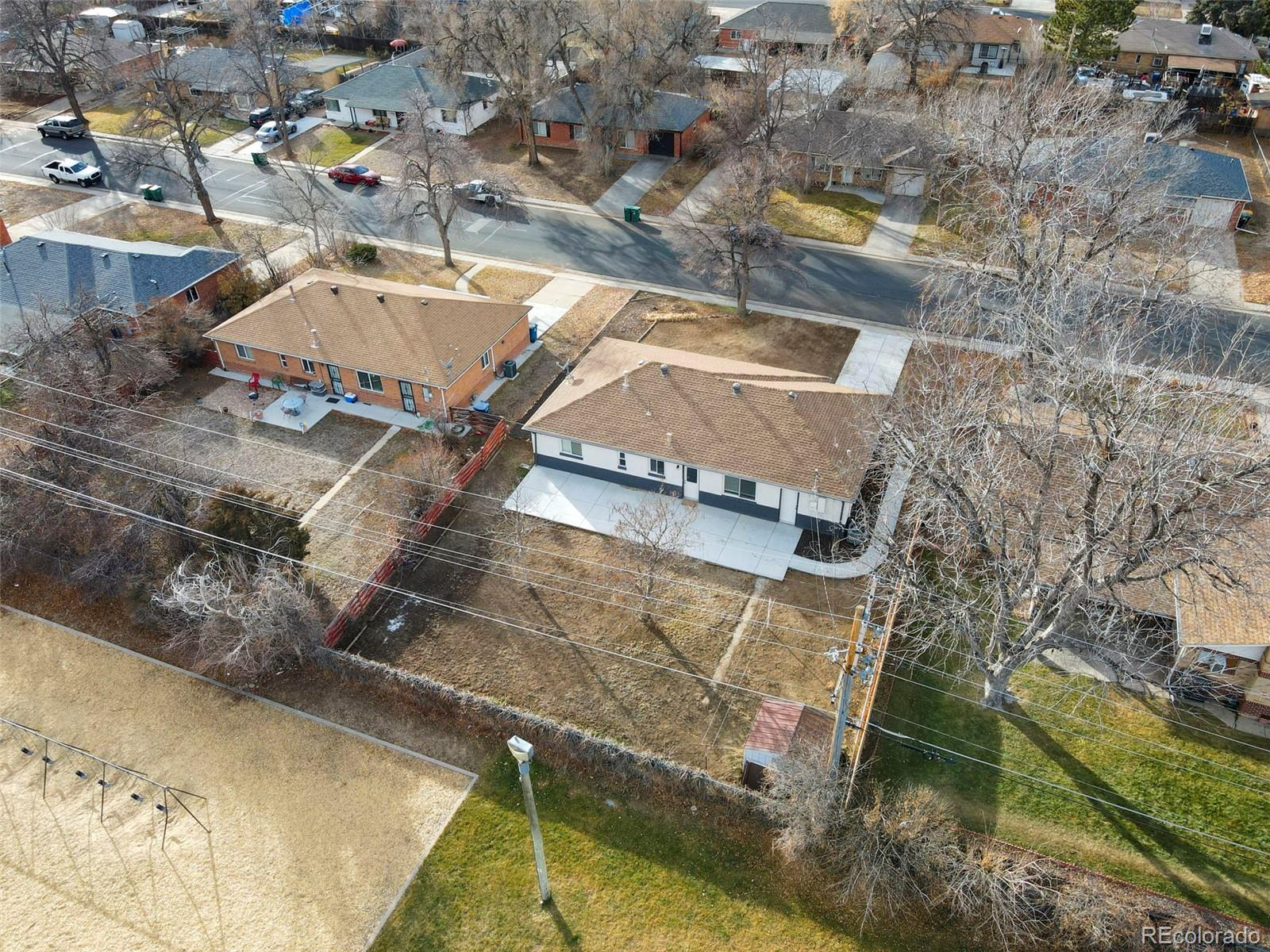 1216 Ursula Street Aurora, CO 80011 - Photo 25 of 30 an aerial view of residential houses with outdoor space