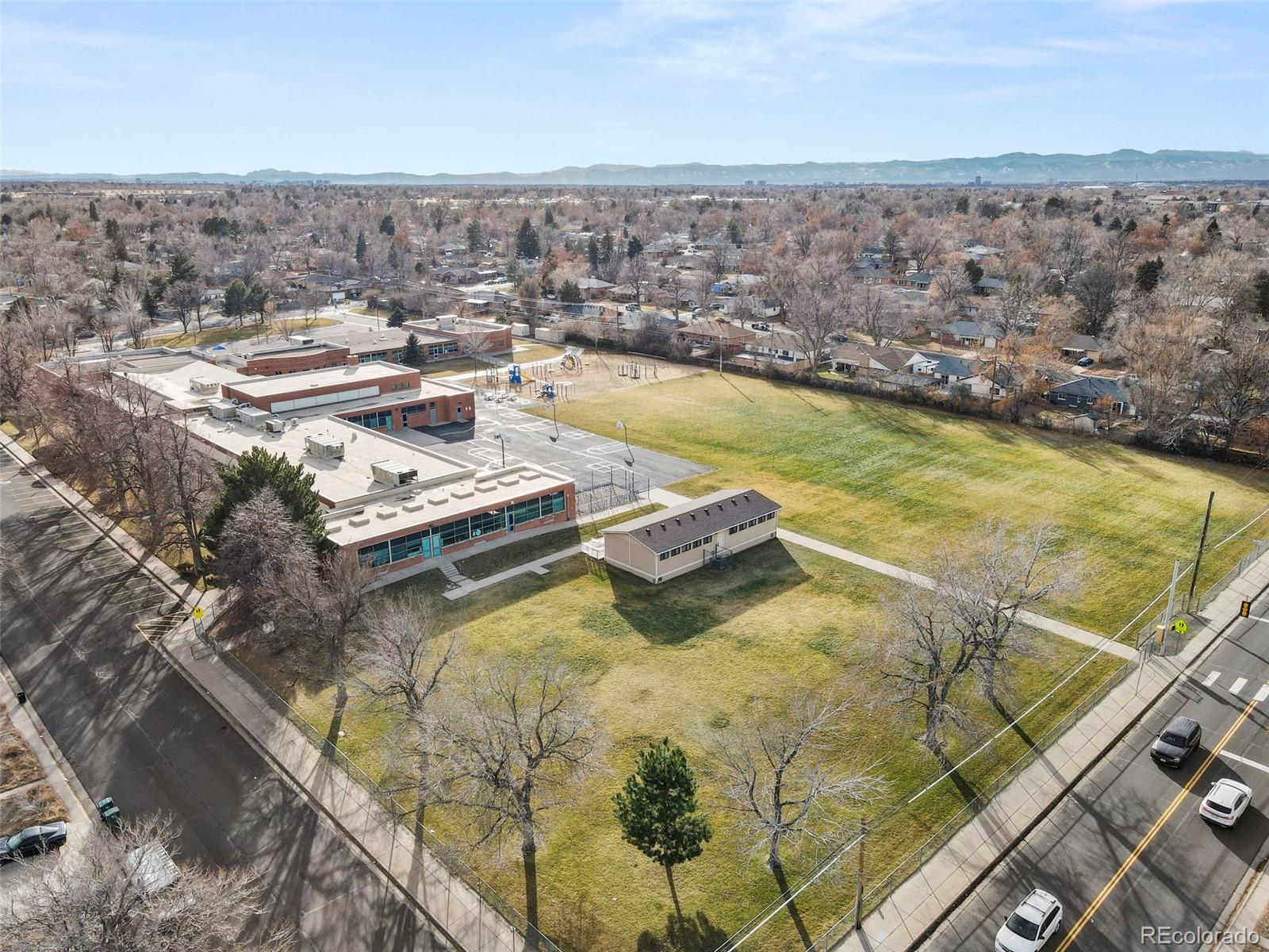 1216 Ursula Street Aurora, CO 80011 - Photo 27 of 30 a view of a swimming pool and an outdoor seating