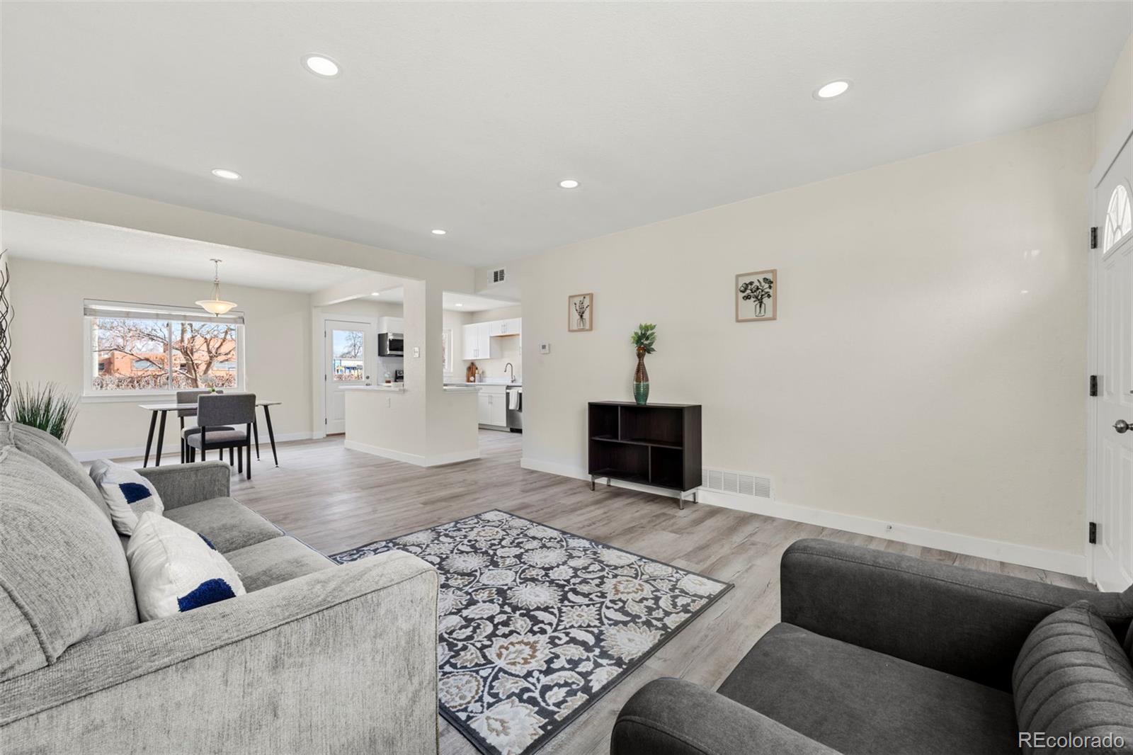 1216 Ursula Street Aurora, CO 80011 - Photo 7 of 30 a living room with furniture