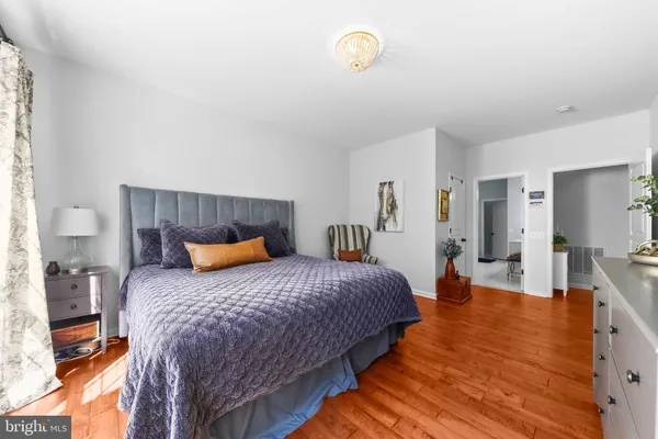 a bedroom with bed and window