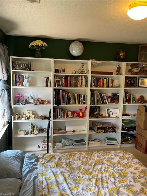 2836 Pickering Road Greensboro, NC 27407 - Photo 22 of 44 2nd bedroom with builtin