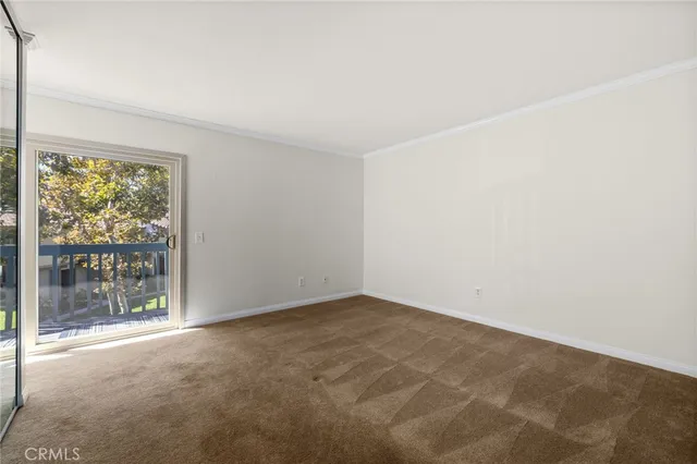 an empty room with sliding door