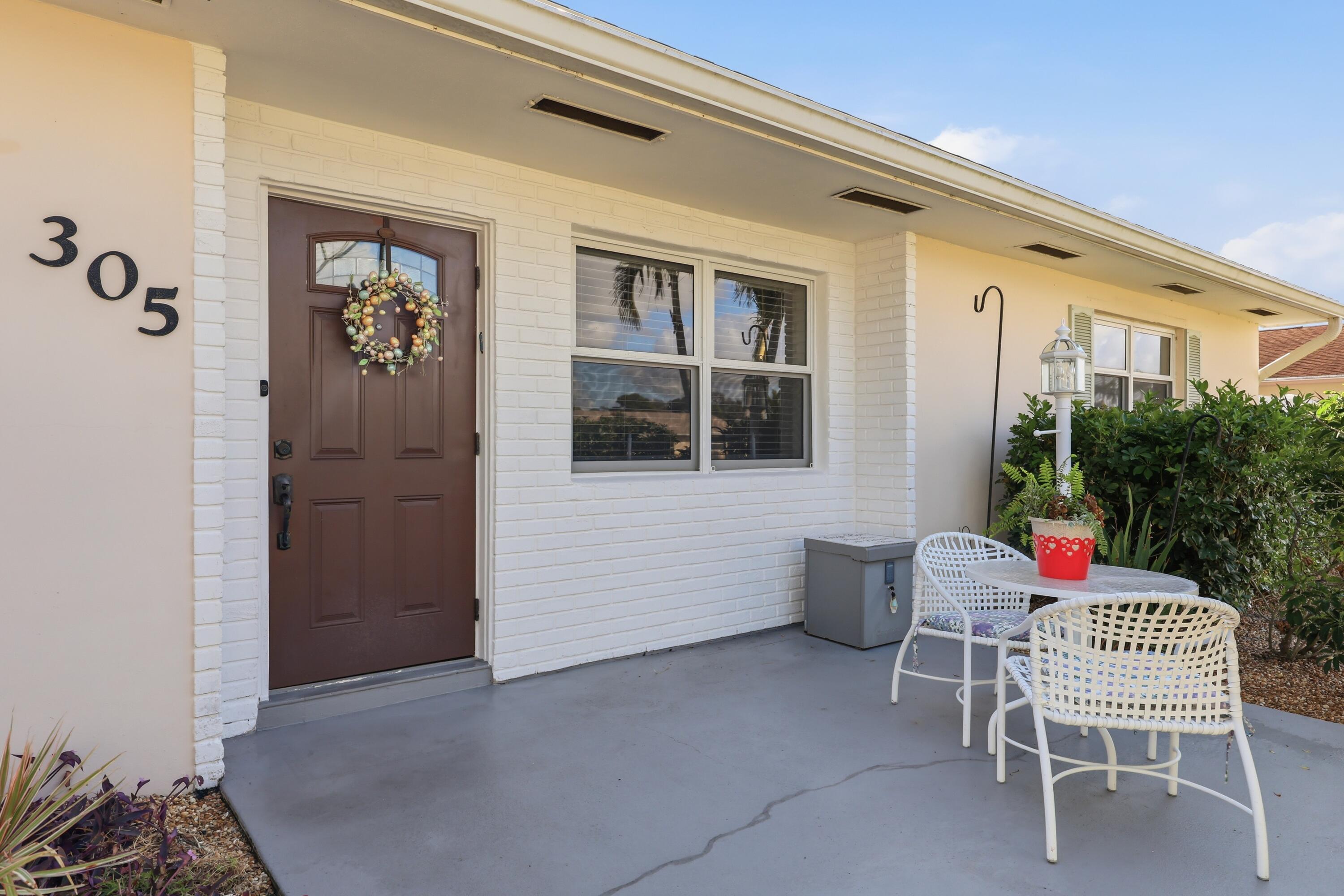 305 Circle East Jupiter, FL 33458 - Photo 2 of 36 Exterior Front Entry