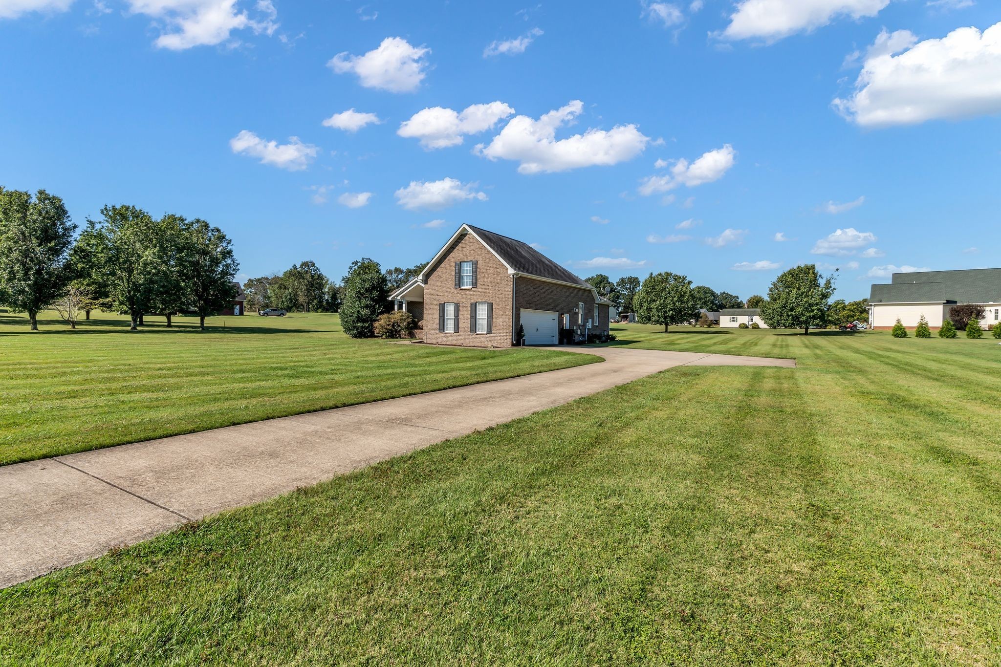 1688 Porter Road Bon Aqua, TN 37025 - Photo 2 of 38 a view of a house with a big yard