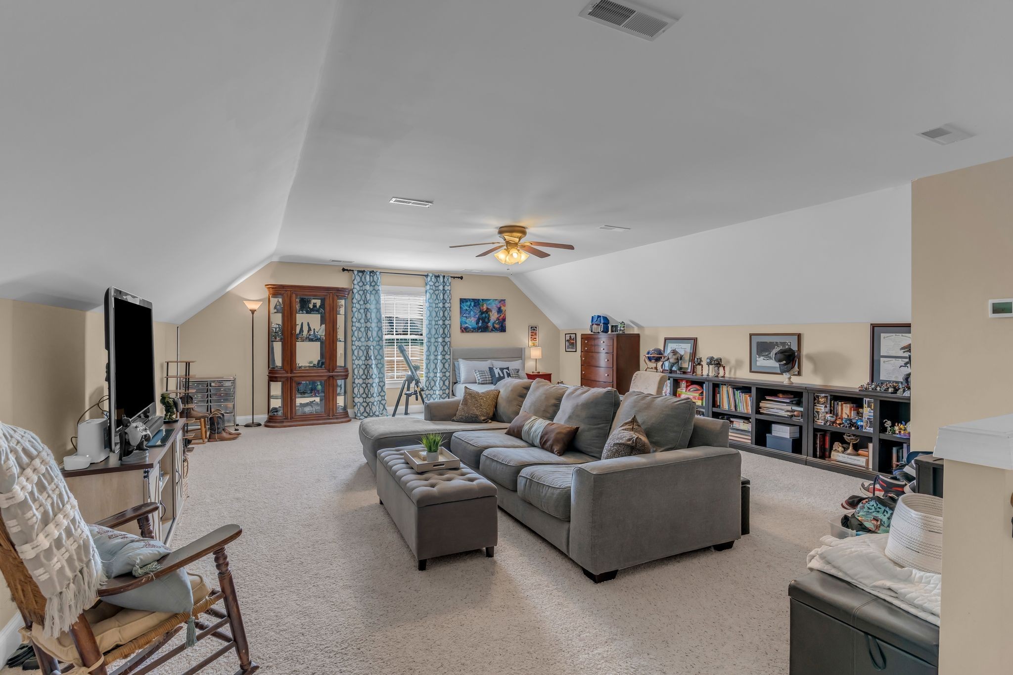 1688 Porter Road Bon Aqua, TN 37025 - Photo 26 of 38 a living room with furniture and a flat screen tv