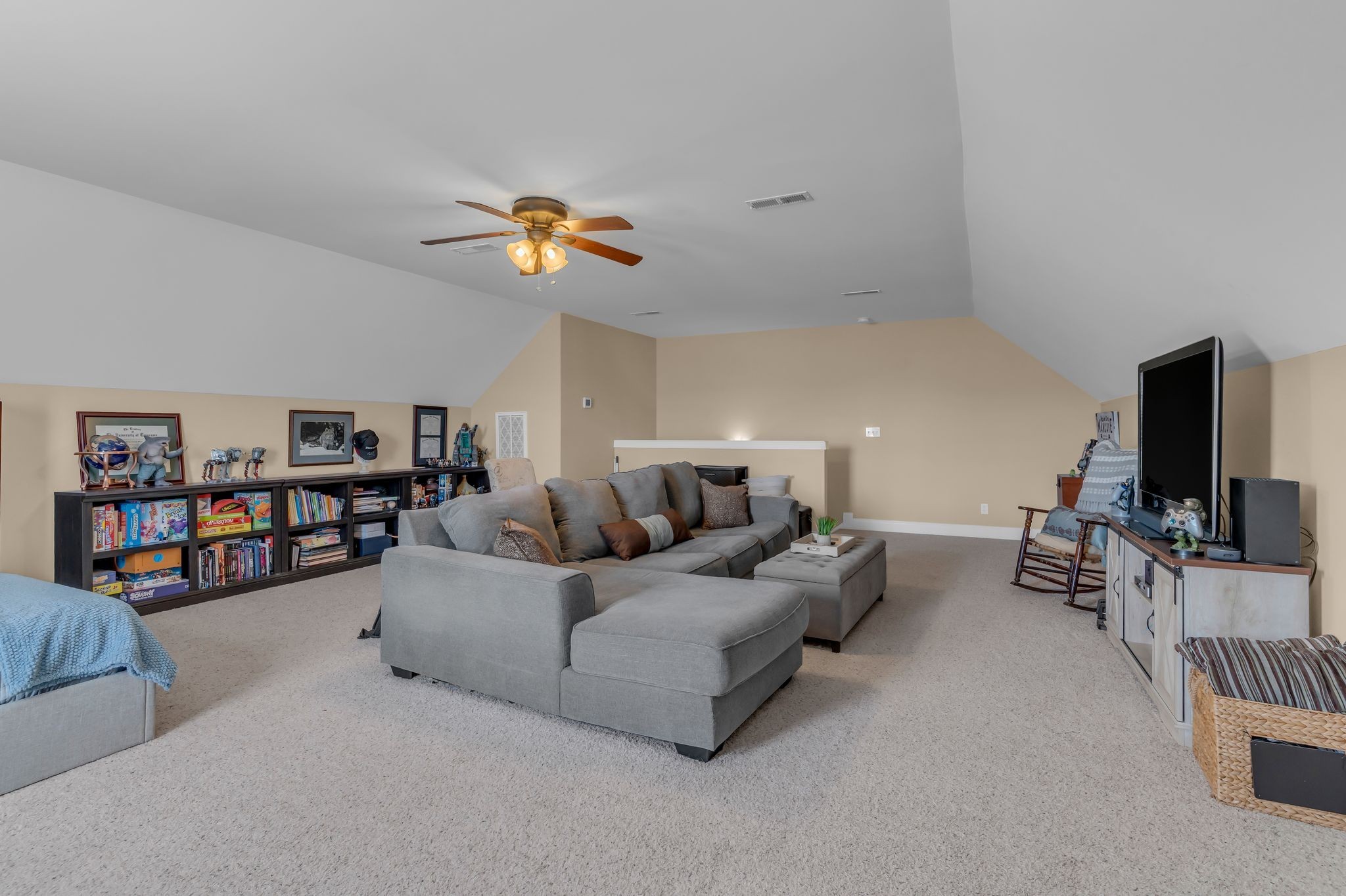 1688 Porter Road Bon Aqua, TN 37025 - Photo 27 of 38 a living room with furniture and a flat screen tv